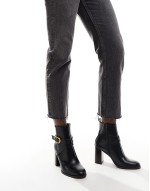 Regan mid-heel buckle boots in black
