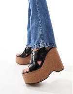 Talent premium leather cross strap wedges in black