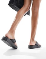Fate padded toe-thong sandals in black