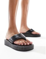 Fate padded toe-thong sandals in black