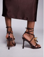 Nobel flower detail caged high heeled sandals in brown